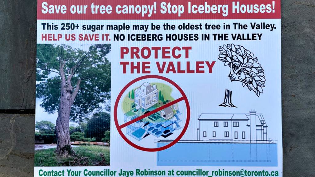 A sign protesting a former iceberg home in Hoggs Hollow