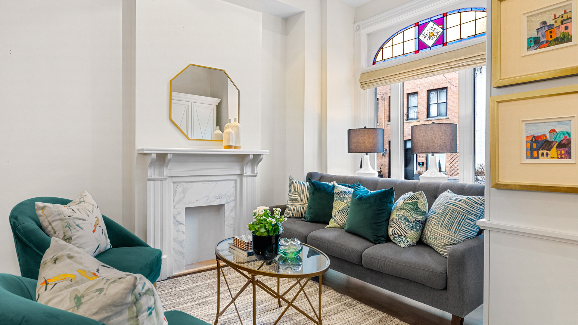 15 Ottawa St. living space with fireplace and stained glass