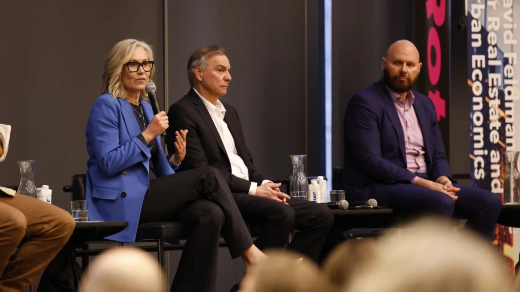 Developer Jennifer Keesmaat speaks at a panel with economist Benjamin Tal and developer Brad Lamb to her left