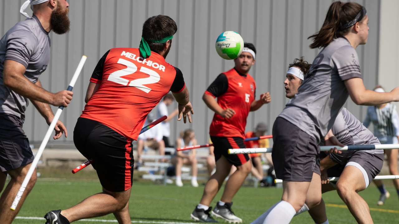 People playing the sport of quadball